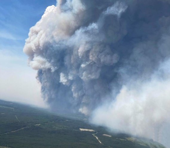 Hundreds ordered to evacuate as wildfire burns across Canada-US border