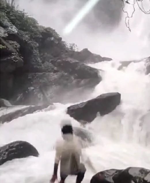 Youth watching Karnataka waterfall slips from rock into water, search underway