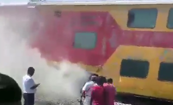 Smoke on Chennai-Bengaluru Express triggers panic Smoke on Chennai-Bengaluru Express triggers panic