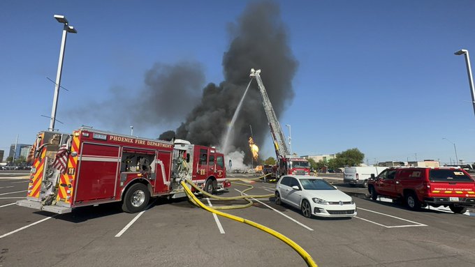 Massive fire rages near Phoenix airport after propane tanks explode