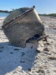 Mysterious piece of metal cylinderical shape washed on the beach of western Australia.