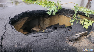 Main Road Caves In Between Chief Minister’s Residence and 1090 Crossing